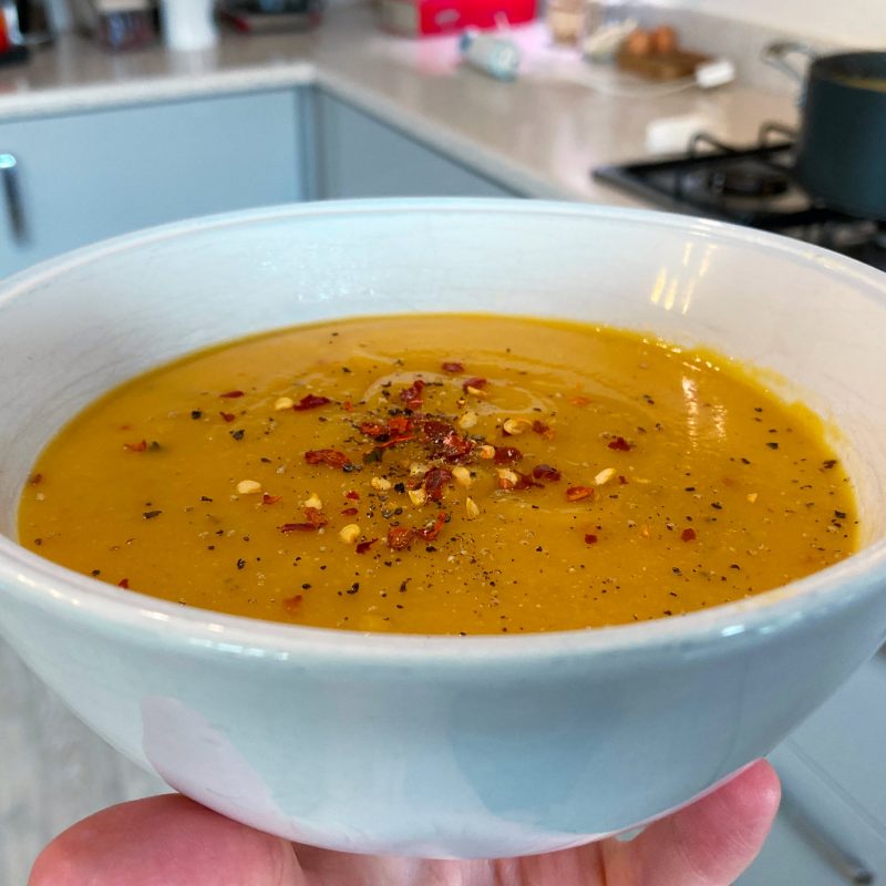 Autumn Food. If you are looking for Autumn fooA bowl of hot sweet potato, rosemary, chilli and garlic soup with chilli flakes and cracked pepper on top