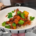 Bean stew with rice and coriander