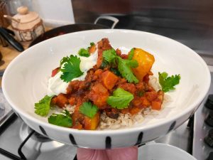 Bean stew with rice and coriander