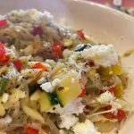 Courgette orzo served with crumbled feta and a sprinkle of parmesan.