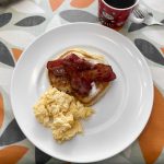 Simple, fluffy pancakes from the easiest recipe served with crispy bacon and scrambled eggs. And black coffee, of course!